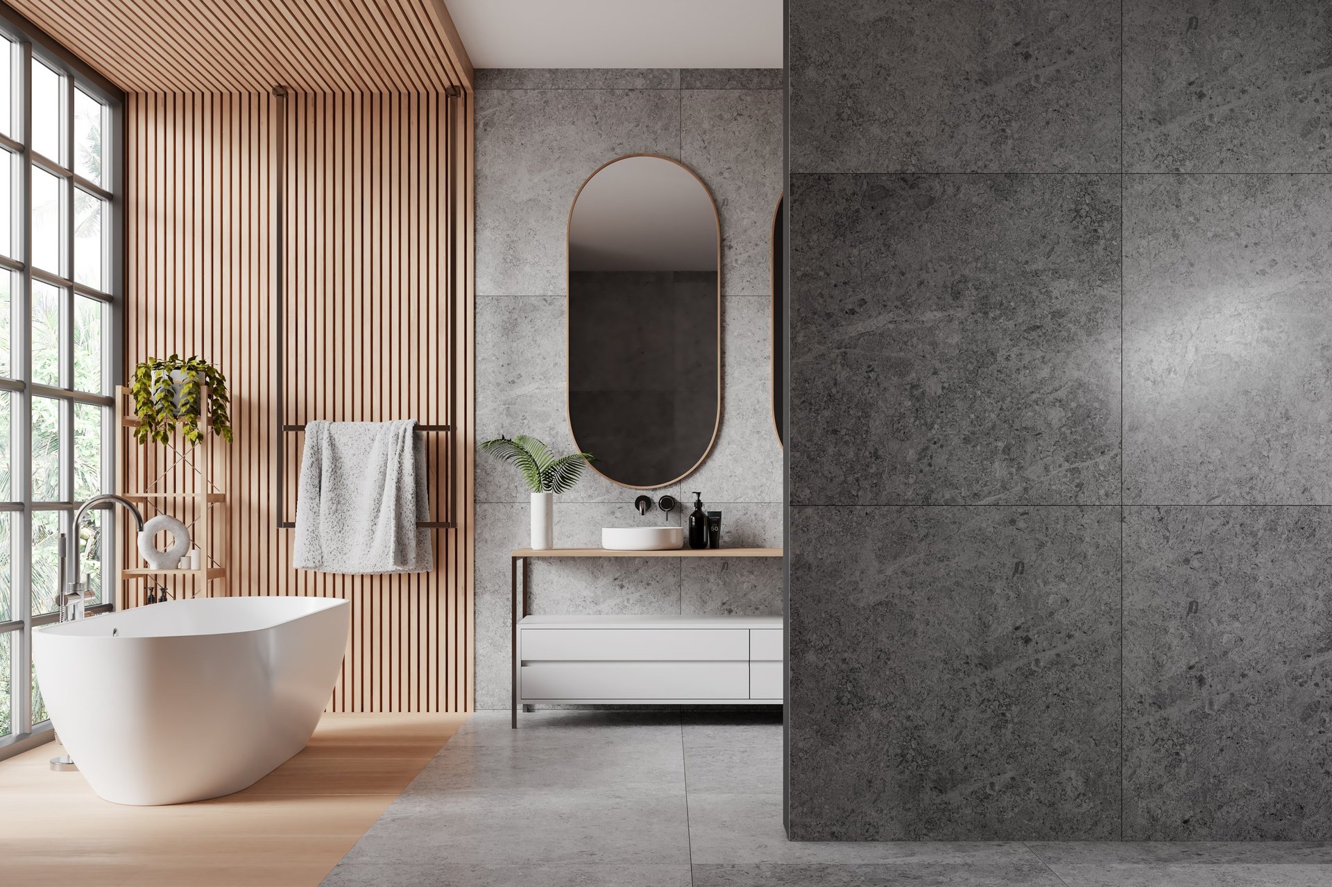 Interior of luxury style bathroom in hotel suite with stone, wooden walls, concrete floor, cozy white bathtub standing near panoramic window