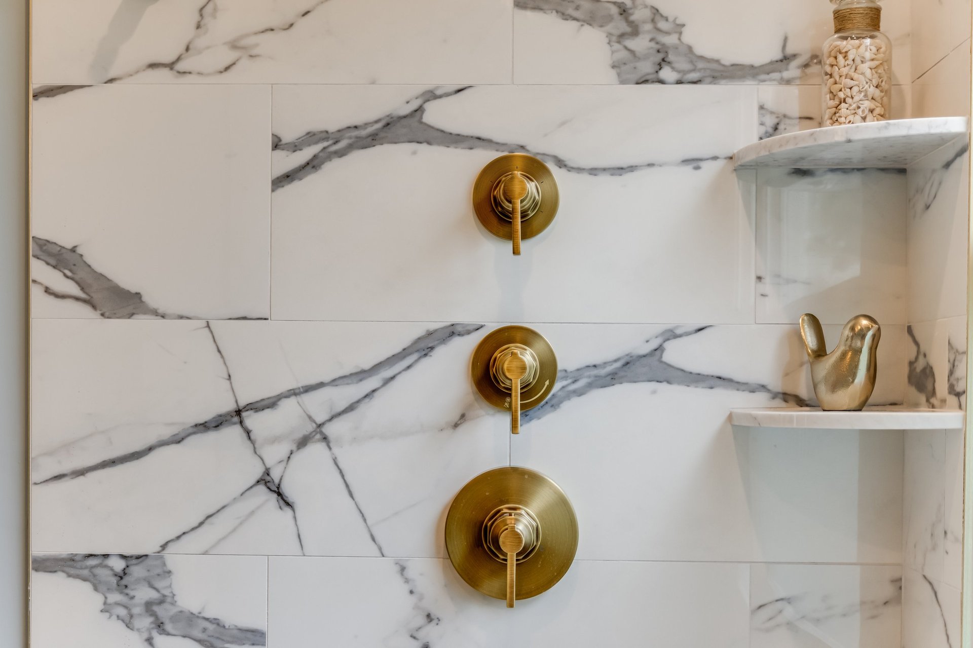 Controls for shower heads in a bathroom